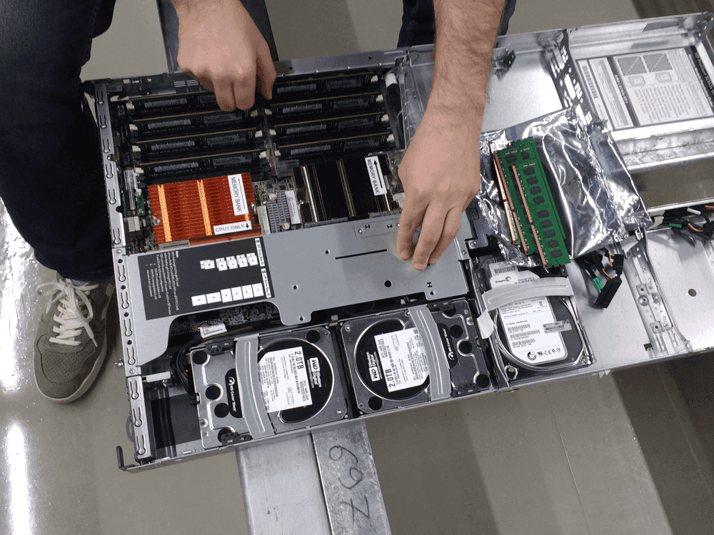 Image of one of our admins adding more RAM to the Galaxy Server